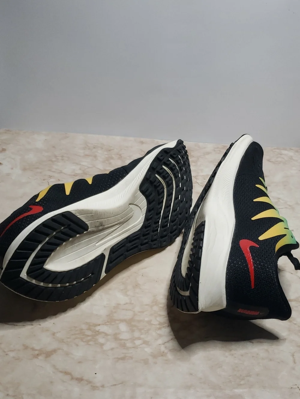 Nike Men’s Black Running Sneakers with Teal, Yellow & Red Accents 7.5